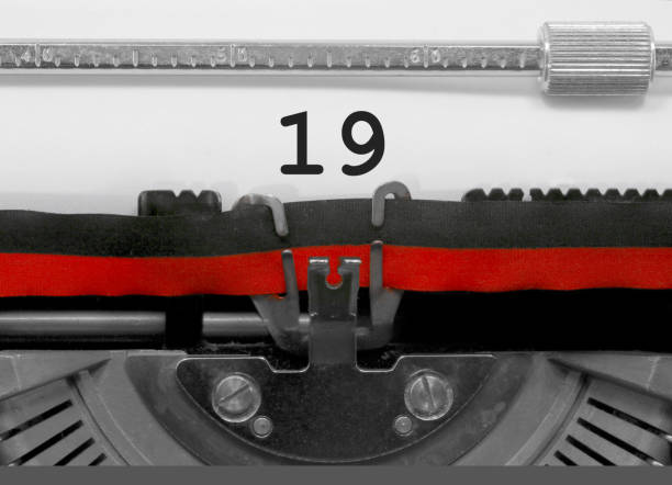 istock 19 Number by the old typewriter on white paper 960539752