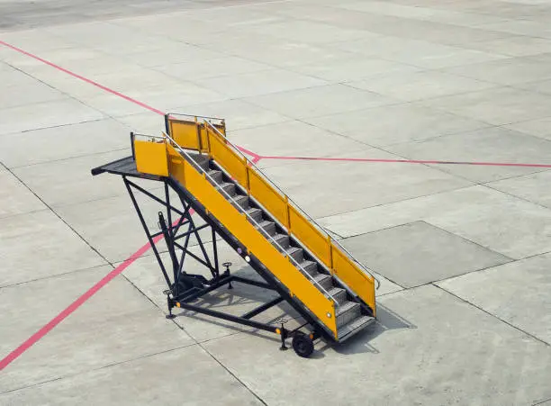 Ladder of plane. Empty gangway on aerodrome