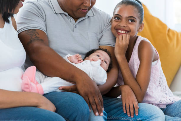 istock Proud parents with their daughters 960545444