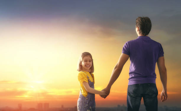 istock family at sunset 960551078