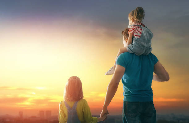 istock family at sunset 960551084