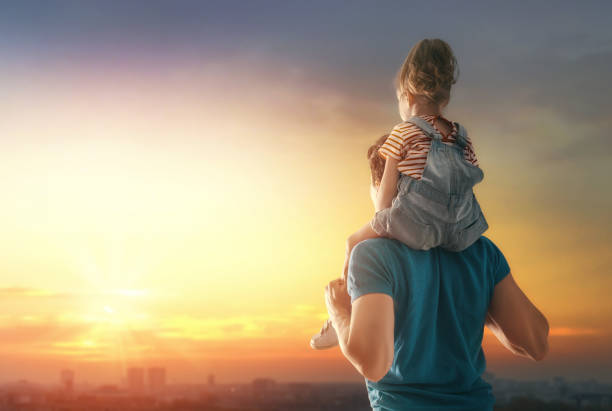 istock family at sunset 960551088