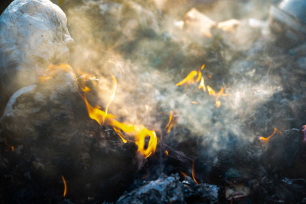 istock fire and smoke burning garbage pile to air pollution 960552870