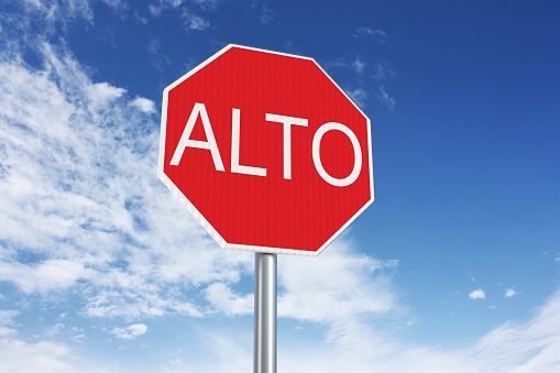 Central American stop (alto) sign on sky background, 3d render