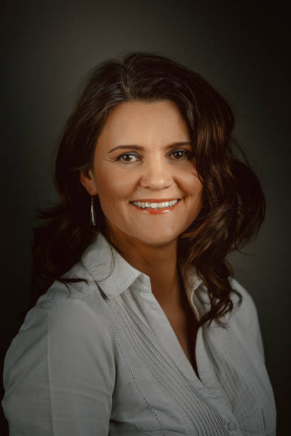istock Brown haired Mature Woman Portrait 960560156