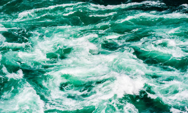 Abstract water currents and rapids in green river