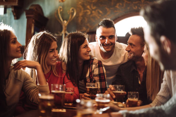 istock people talking indoors in a pub with the beers 960567086