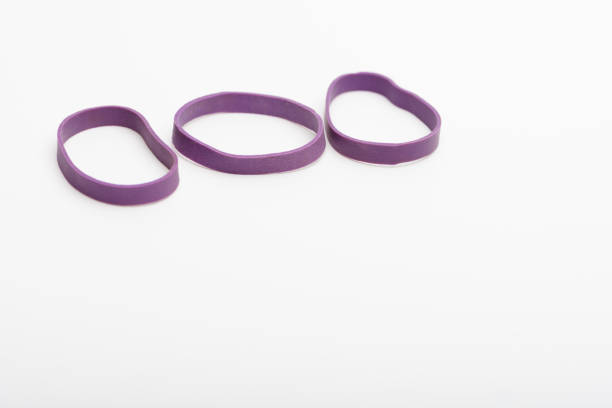istock Purple rubber bands isolated on white background. 960567150