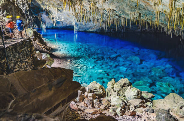 Inside the grotto of Lago Azul, a grotto with a lake with transparente vibrant blue water stock photo
