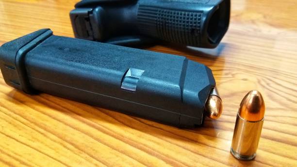 istock Pistol or gun and bullet 960574610