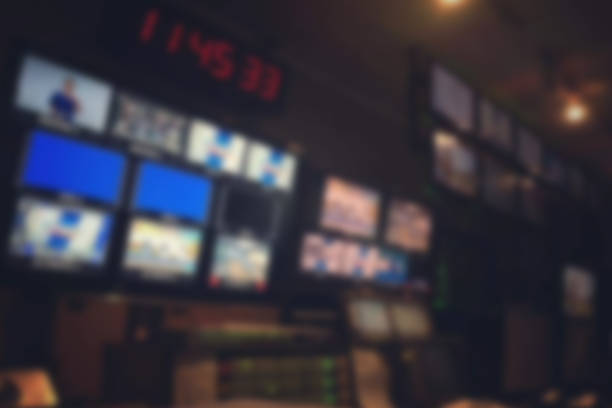 istock Blur image video switch of Television Broadcast, working with video and audio mixer, control broadcasts in recording studio. 960579142