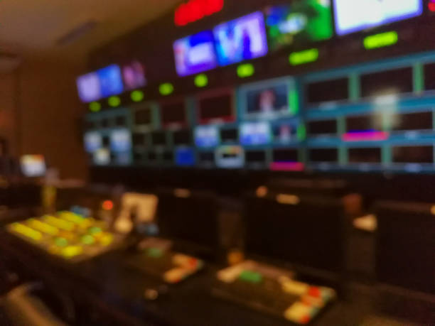 istock Blur image video switch of Television Broadcast, working with video and audio mixer, control broadcasts in recording studio. 960579160