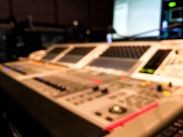 istock Blur image video switch of Television Broadcast, working with video and audio mixer, control broadcasts in recording studio. 960579164