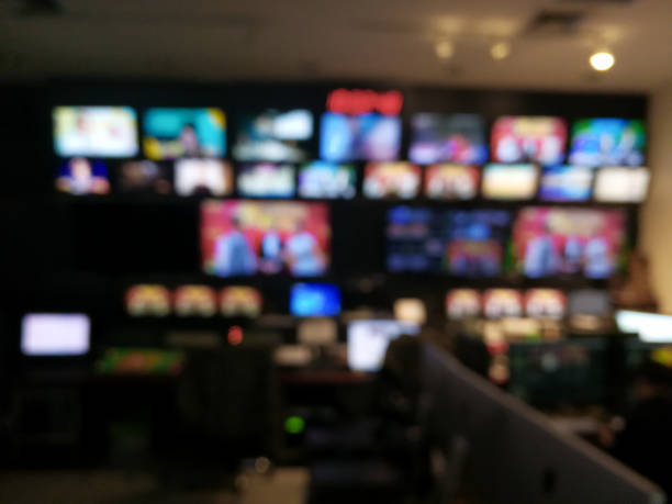 istock Blur image video switch of Television Broadcast, working with video and audio mixer, control broadcasts in recording studio. 960579304