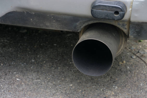 istock Car exhaust pipe., Close up intake exhaust under car vehicle. 960582956