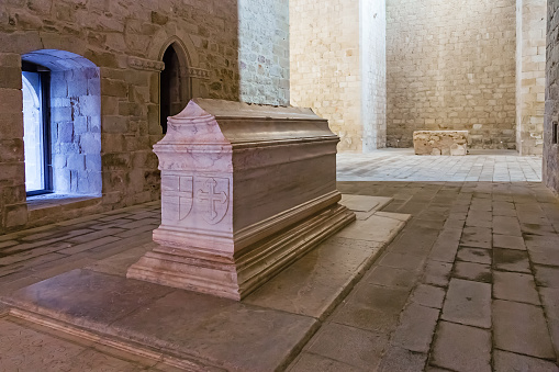 Crato, Portugal - February 26, 2015: Tomb of Dom Alvaro Goncalves Pereira in the nave of the church of the Flor da Rosa Gothic Monastery. Hospitaller Crusader Knight of the Malta Order.