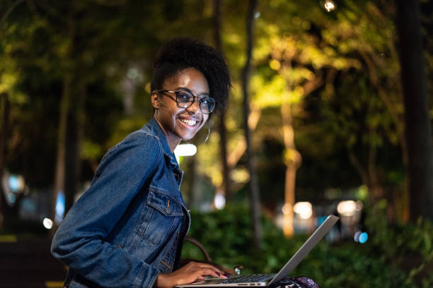 istock Afro young woman working in her laptop 960583104