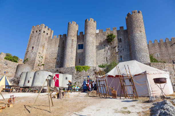 Obidos, Portugal - August 09, 2015: Obidos Castle during the Medieval Fair reenactment. Obidos is a medieval town inside walls, and very popular among tourists.