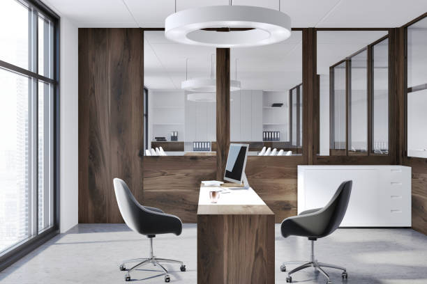 istock White and wooden company manager office side view 960583554