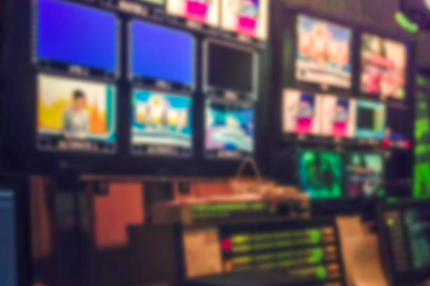 istock Blur image video switch of Television Broadcast, working with video and audio mixer, control broadcasts in recording studio. 960586350