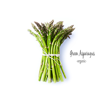 Fresh Green Asparagus on White Background; organic vegeatbles