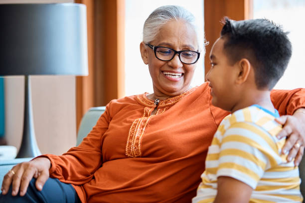 istock Smiling senior woman looking at grandson 960594770
