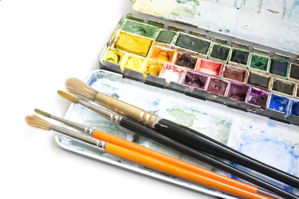 istock Watercolor box and brushes isolated on white 960597692