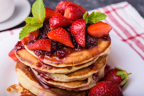 istock American pancakes with jam and fresh strawberries 960600346