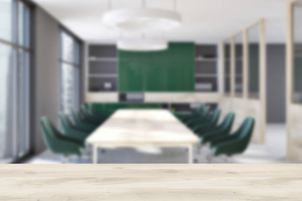istock Gray and green meeting room interior blur 960601066