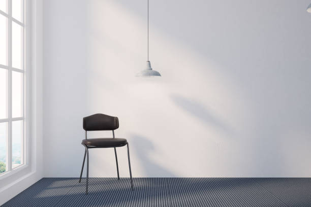 istock Empty room with white walls and a chair 960601442