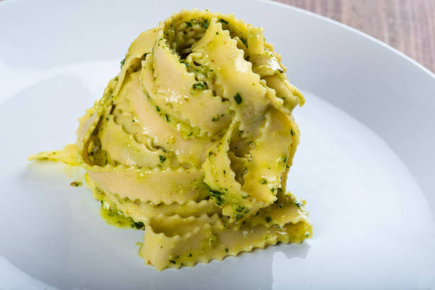 istock Homemade fresh egg pasta with pesto sauce 960604246