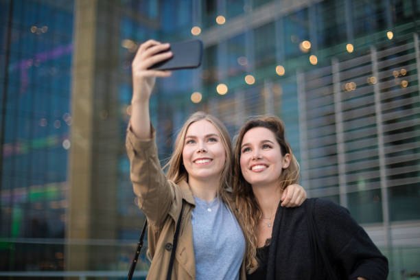 istock Two friends making a selfie at the city. 960604270