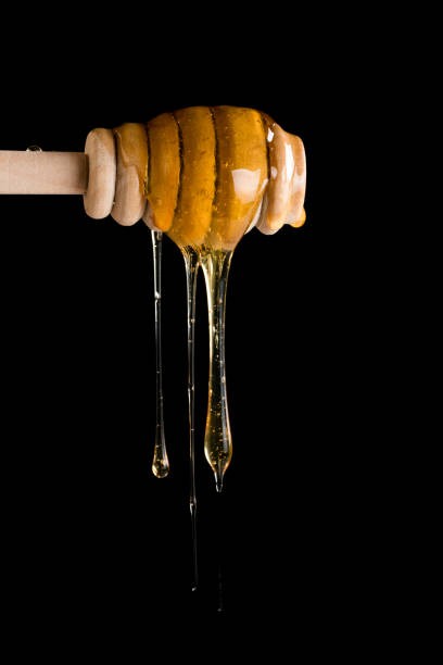 istock honey and honey spoon 960617256