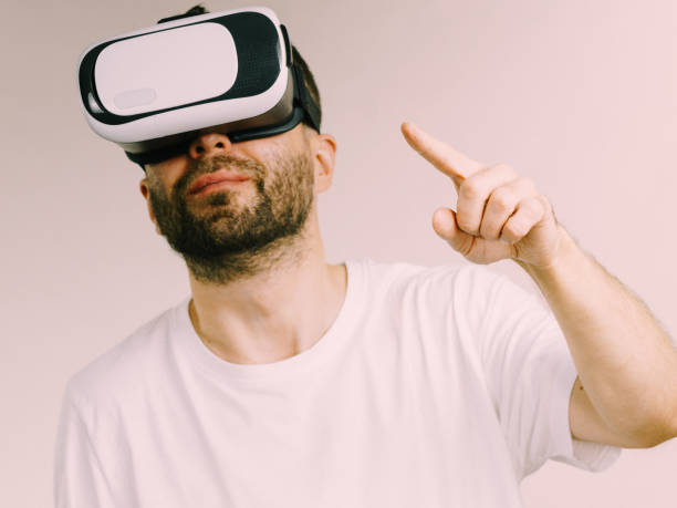 istock Adult man wearing vr goggles 960618180