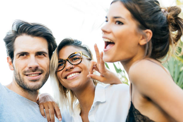 istock Happy friends posing at photo shooting 960618192