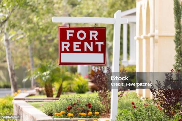 Red For Rent Real Estate Sign In Front House Stock Photo - Download Image Now - For Rent Sign, House Rental, Apartment
