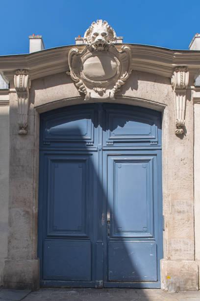 istock Paris, old blue wooden door 960637428
