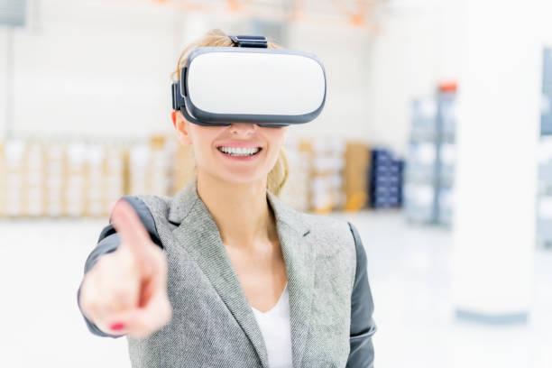 istock Virtual reality & woman at warehouse 960642350