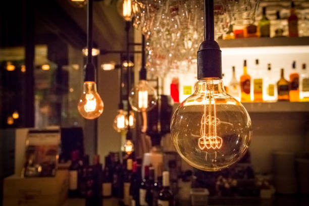 istock Vintage lamp bulb with bar or cafe night abstract background 960644576