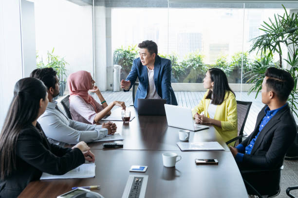 istock Business manager speaking to colleagues during meeting 960645112