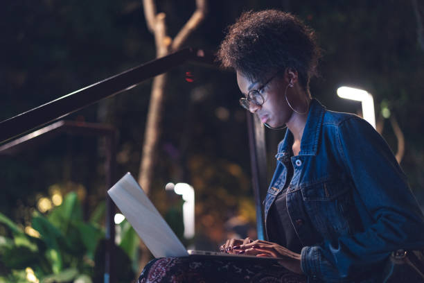 istock Afro young woman working in her laptop 960658548