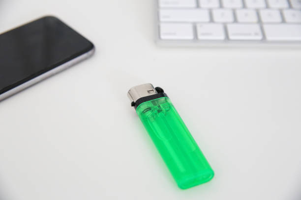istock Close-up of a green lighter on the table 960666212
