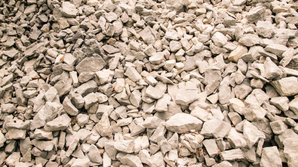Background formed by a quarry of white pebbles.
