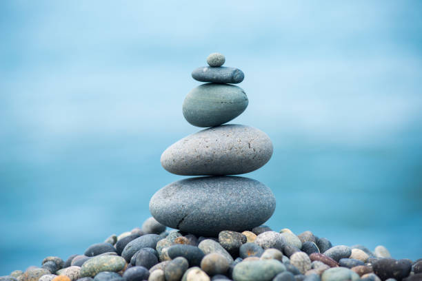 istock Making pyramids from beach pebbles. Nature and balance concept/ Artvin,Turkey,25 July 2017 960687032