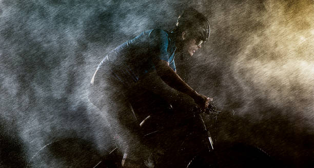 Brunssum, February 17, 2022 - Young woman defy the rain and storm by walking upwind.