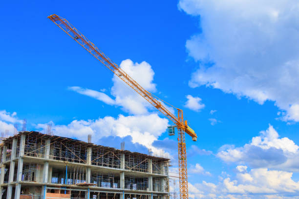 istock work construction in building high site and tower crane work outdoor with copy space add text 960699126