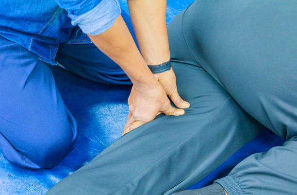 istock student education coaching massage finger the press on leg ( Traditional massage Thai medicine) 960699760