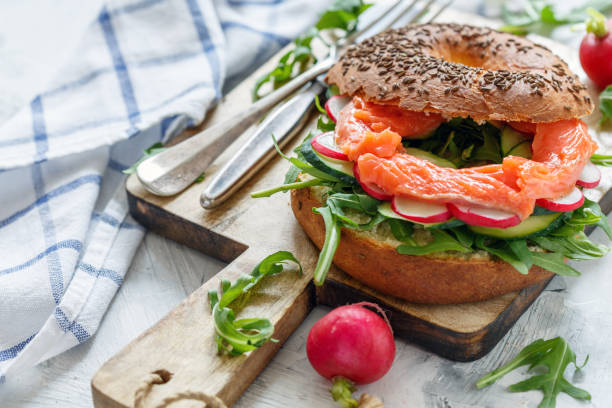 istock Fresh bagel with arugula, radish and smoked trout. 960711140