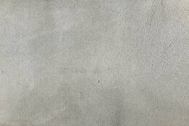 istock Concrete floor, gray texture background. Empty vintage or grungy concrete open space interior with sunlight. 960715596