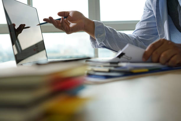 istock Businessman working reading documents graph financial to job succes Analyze document plans 960716192